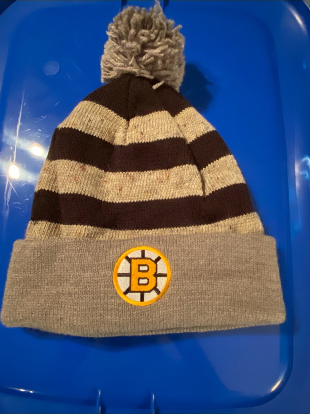 Mitchell & Ness Boston Bruins Striped Pom Beanie - Black, Gray, Gold